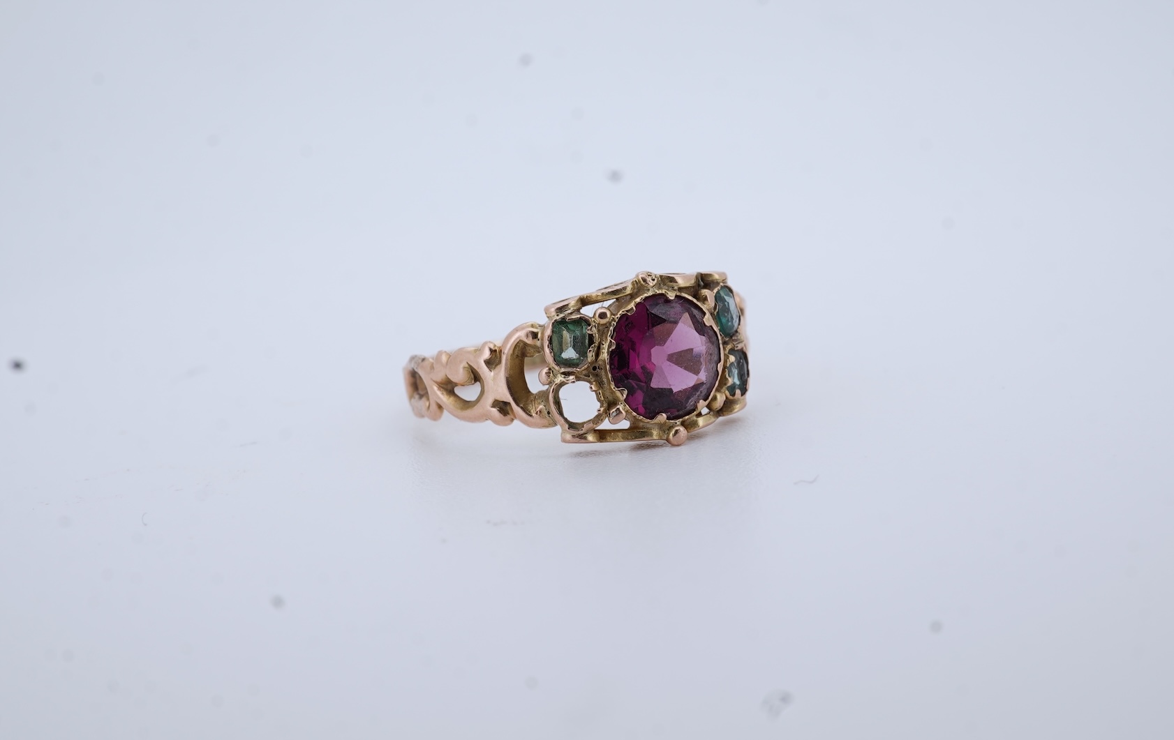 A Victorian garnet and paste ring, circa 1857